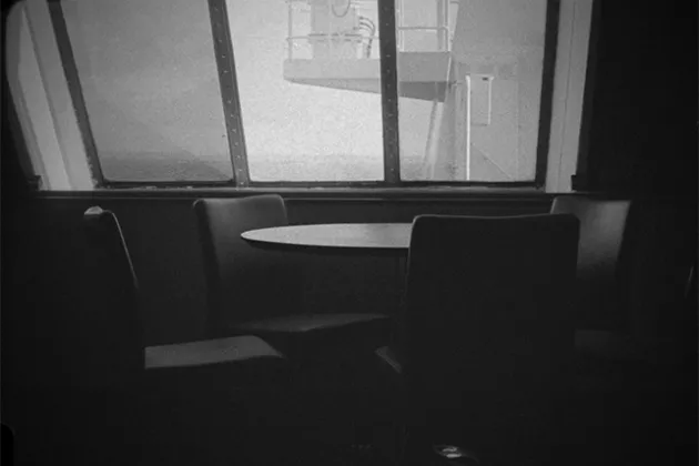 Black and white photo on a ferry. Photograph. 