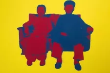 2 asians yellow background